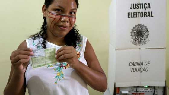 In Amazon, Indigenous voters wear Lula support painted on faces