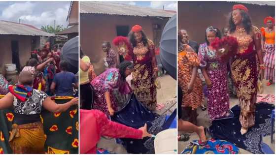 Villagers treat bride like queen as she gets married, lay their wrappers on ground for her to walk on in video