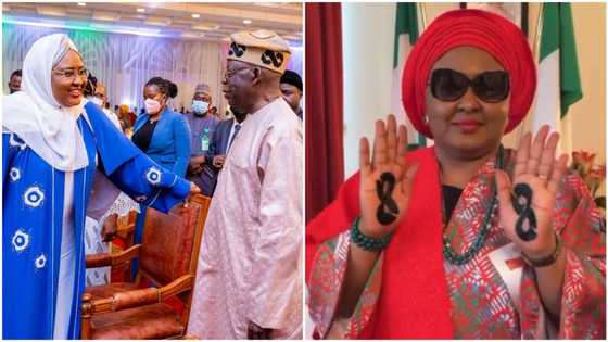 Aisha Buhari displays tattoo of Tinubu's cap logo on her palms, leads campaign front in viral video