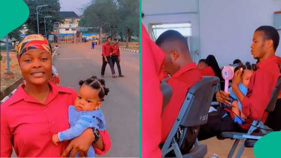 Nigerian man who is medical student comes to school with his little child, listens to lectures