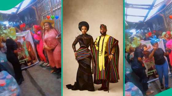 Nigerian women take to the street holding large banner, celebrate Davido and Chioma’s wedding