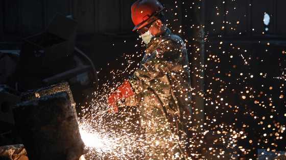 China's manufacturing shrinks in April as trade war bites