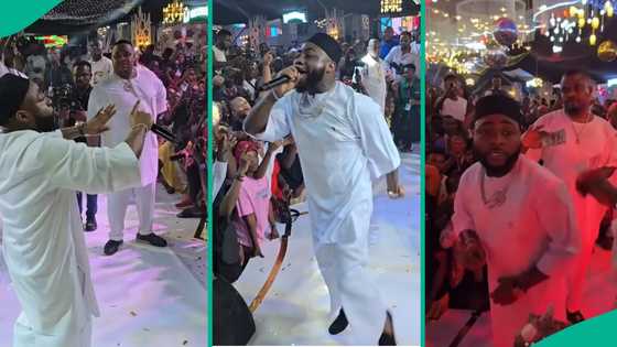 Davido performs at burial ceremony in Anambra, Cubana Chiefpriest spotted as dollars rain in video