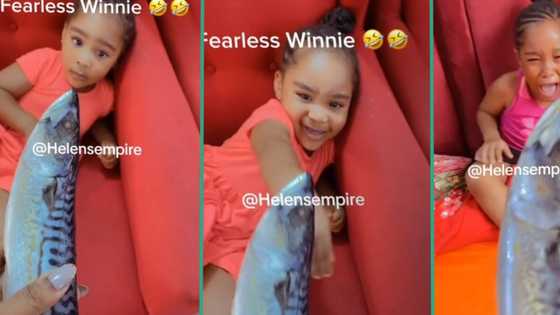 "Mummy why?" Little girls fear as Nigerian mum pranks them with fish in funny video