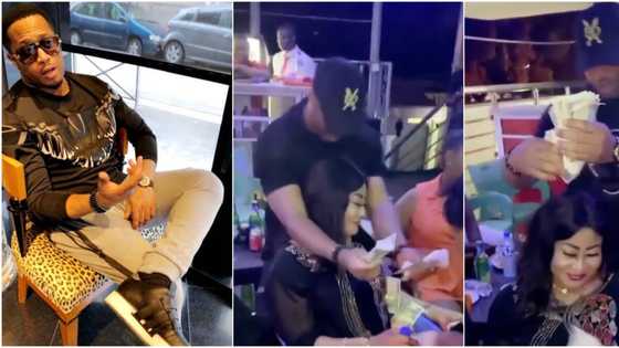 Fans hail actor Mike Ezuruonye as he sprays actress Ngozi Ezeonu with money
