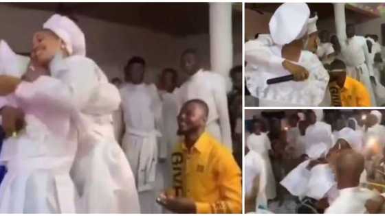 Church members hold lady, prevent her from leaving premises after man pulled a surprise proposal on her