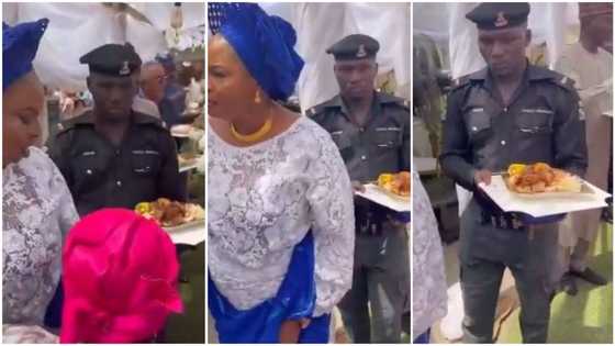 This is embarrassing: Nigeria police summon officer caught carrying food tray for VIP at party in viral video