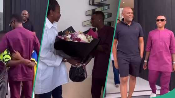 "Just have money": Wizkid visits Tony Elumelu's mansion, gifts his wife bouquet of flowers in video
