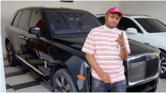 Na where he dey spend money: Video emerges as Isreal DMW visits strip club, rains N500 notes on pretty dancer