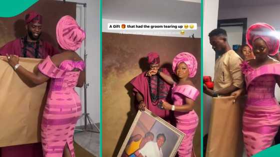 Bride gifts her groom a framed photo of late mother taken with him, moves him to tears emotionally