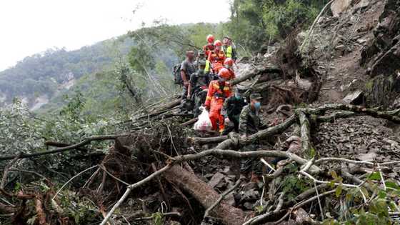 Downpours and mudslides hamper China earthquake rescue mission