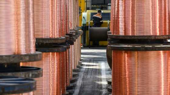 Asian markets slump as traders take profits, eye commodities' spike