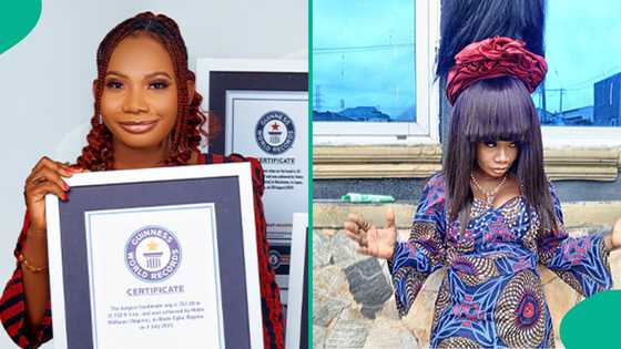Nigerian lady sets Guinness World Record for tallest wig measuring 50.42ft