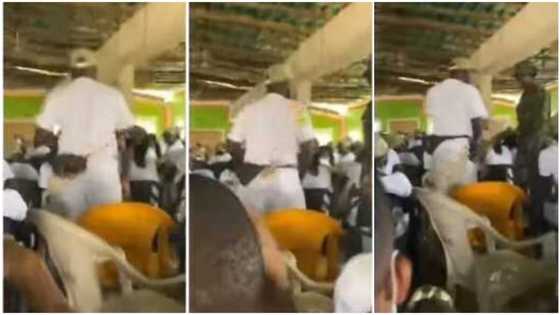 Soldier punishes corps member for sleeping in camp, video shows him jumping up and down, people laugh