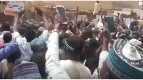 Drama as PDP guber candidate in Northern state allegedly gets stoned while voting in same polling unit as APC chairman (video)