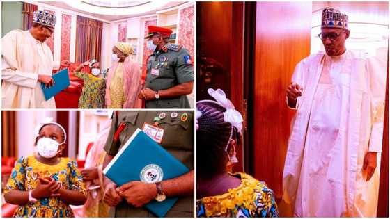 Little girl shows uncommon confidence, salutes Buhari as ex-ADC's family visits Aso Villa, photos go viral