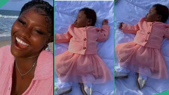 Photographer in dilemma as new born baby sleeps off during photoshoot, video trends online