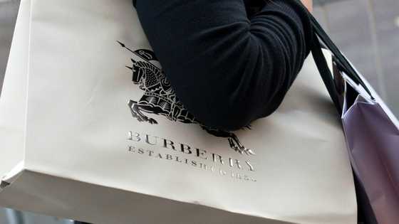 Burberry narrows first half loss on turnaround plan