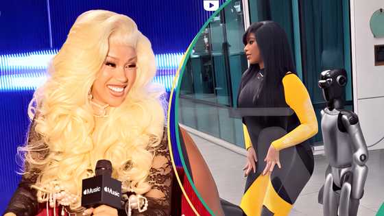 Cardi B falls to the ground while giving robot a lap dance, fans react: “He caught real feelings”