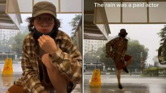 Won't he fall? Reactions as man dances inside rain with amazing leg moves, video goes viral