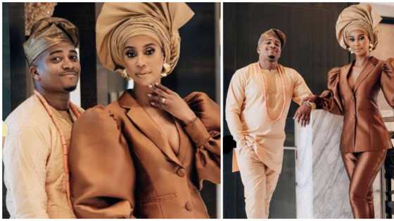 Thinking outside the box: Lady pairs pantsuit with gele in new photos, wows internet users