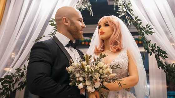 Excitement as young man finally marries his beautiful doll, video of the lavish wedding goes viral