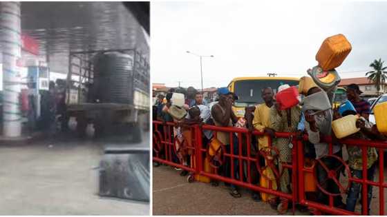 Fuel scarcity: Nigerians react to viral video of fuel being bought at filling station in a tank