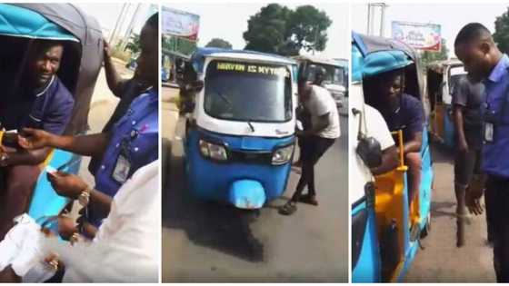 Nigerian policeman stops keke driver on expressway, wows the man and his passengers with cash gifts in video