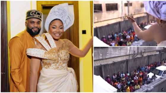 Mercy Chinwo performs from balcony as fans storm dad’s house on her wedding introduction day, video goes viral