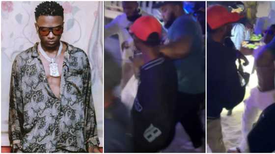 Wizkid gives man dirty slap for trying to 'grab' his diamond necklace, he screams in pain, video trends online
