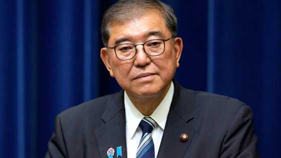 'Trump Whisperer' ex-minister joins Japan PM race