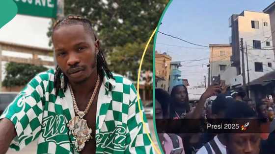 Lagosians take to the street to show love to Naira Marley as he shoots music video, netizens react