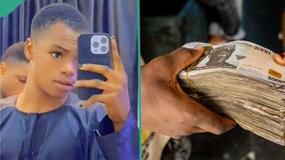 "I have N900k in my account": Young man lists his achievement in 2023, flaunts iPhone 14 Pro Max