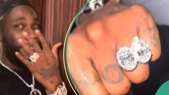 Burna Boy screams as he wears N1.8bn newly acquired ring: "These are the biggest diamonds in the world"