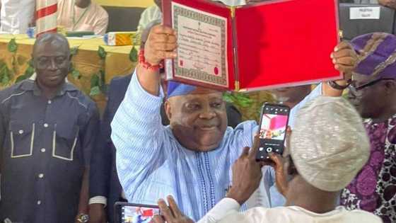 Breaking: hours after Davido’s outcry, INEC presents certificate of return to his uncle, Adeleke