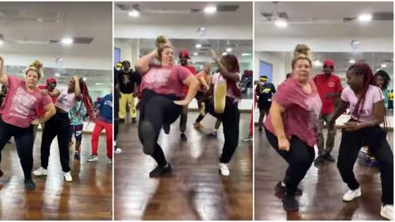 How did she do it? Plus-size Oyinbo lady steals show at gathering, shows sweet Nigerian dance moves in video