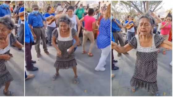 Old woman in sandals causes stir on street, shows off sweet leg dance moves and twerks on man in video