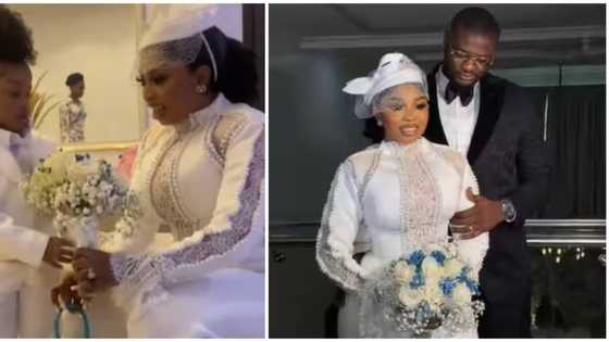 Civil slay: Bride and daughter dazzle in white for her court wedding