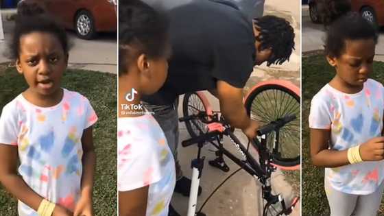 "You're not my father": Little girl boldly tells stepdad as he helped repair her bicycle, mixed reactions trail video