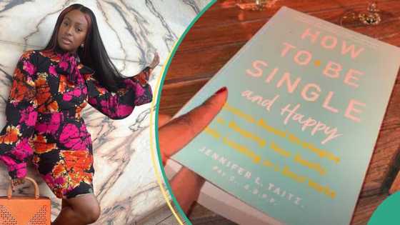 "She don give up on relationship finally": Drama as DJ Cuppy reads book on how to be single & happy