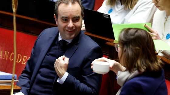 French lawmakers adopt social security budget, suspend pension reform
