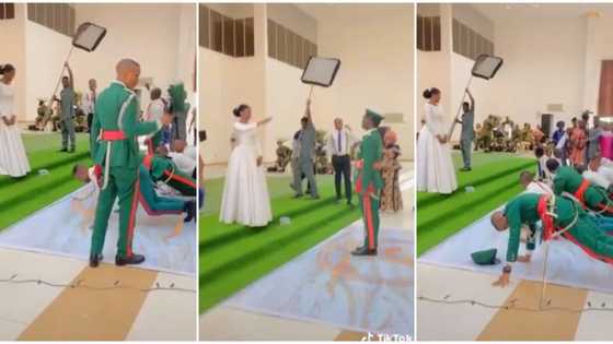 Bride treated like a queen at wedding as her military groom and his boys prostrate in uniforms before her