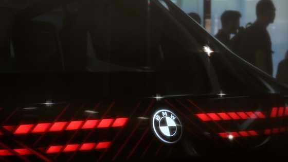 BMW says can weather tariff storm despite profit plunge