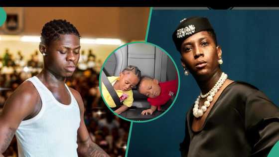 Bella Shmurda shares video of Mohbad's son and his son dozing off in his car, netizens spot fault