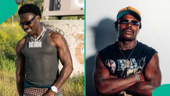 Asake trends as he struggles to touch the Black Stone at Kaaba during visit to Mecca, fans react