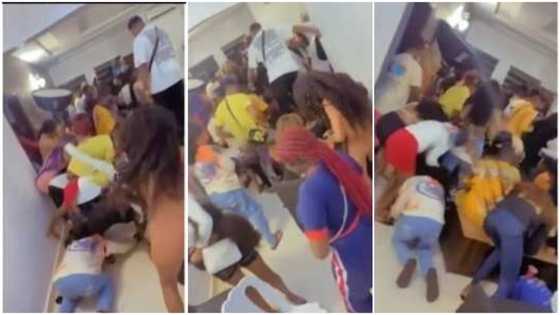 Slay queens fight over money sprayed at house party as they rush to pick it, one loses her wig in video
