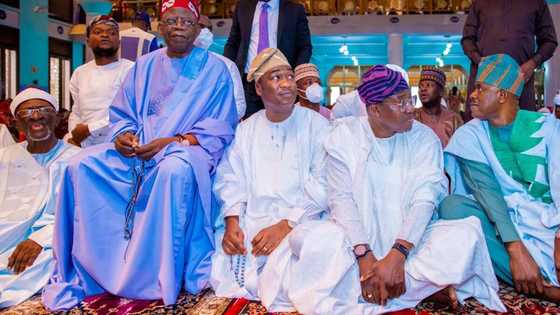 Nigerians ask why Tinubu prays on chair at Eid as photos emerge