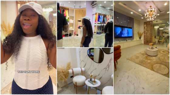 Pretty Nigerian lady showcases her N300m mansion, uses remote control for curtains, has CCTV