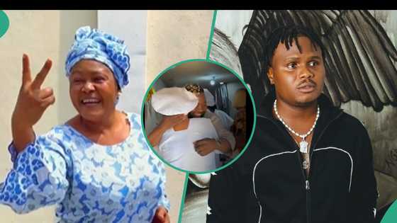 Oluwadollarz's mother accepts proposal from young lover, shares passionate kiss in video: "Skit?"