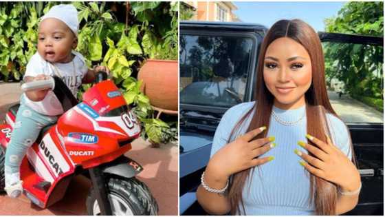 “He looks like a one-year-old”: Regina Daniels shares photos of her 2nd son on a bicycle as he clocks 4 months